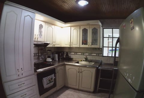 Luxury House | Private kitchen | Fridge, coffee/tea maker