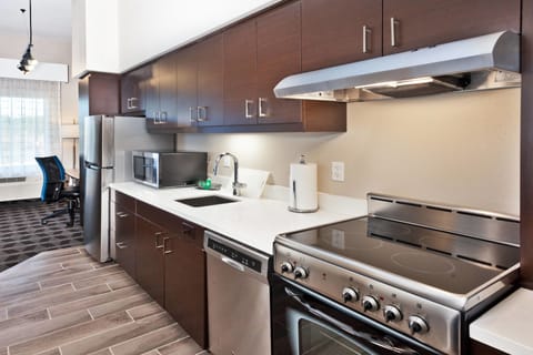 Suite, 1 Bedroom | Private kitchen | Fridge, microwave, dishwasher, coffee/tea maker