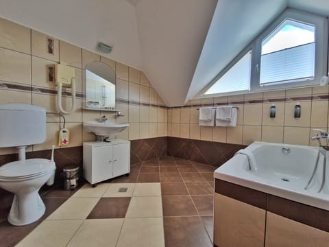 Standard Double Room | Bathroom | Shower, hair dryer, towels