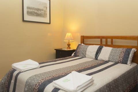 Family Room, Multiple Beds, Shared Bathroom | Free WiFi, bed sheets