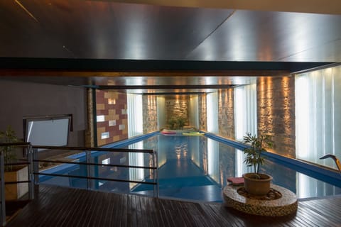 Indoor pool, sun loungers