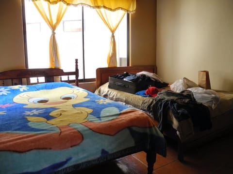 Basic Triple Room, 1 Bedroom, Garden View | In-room safe, free WiFi, bed sheets