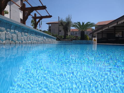 Seasonal outdoor pool, sun loungers