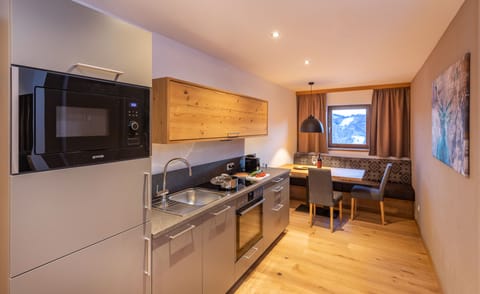 Apartment (Gipfelglanz-80€Cleaning fee not incl.) | Private kitchen | Fridge, highchair, cleaning supplies