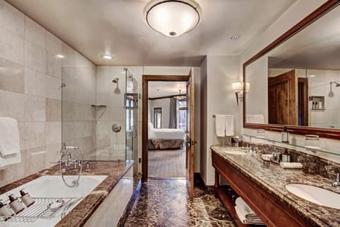 Suite, 1 King Bed (Arrabelle) | Bathroom | Separate tub and shower, deep soaking tub, designer toiletries