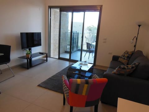 Apartment, 2 Bedrooms | Living room | Flat-screen TV