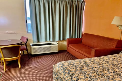 Room, 1 King Bed, Accessible, Smoking | 1 bedroom, desk, iron/ironing board, free WiFi