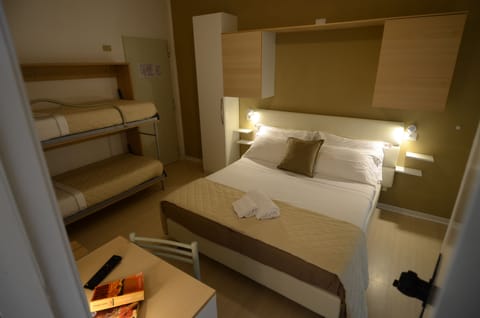 Quadruple Room | Premium bedding, minibar, in-room safe, desk