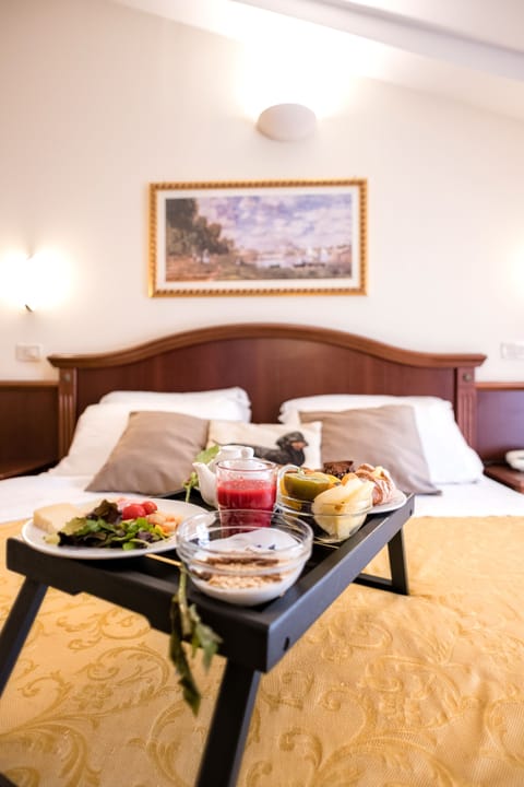 Superior Double Room | Minibar, in-room safe, desk, iron/ironing board