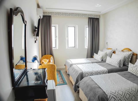 Standard Triple Room | Premium bedding, minibar, soundproofing, free WiFi