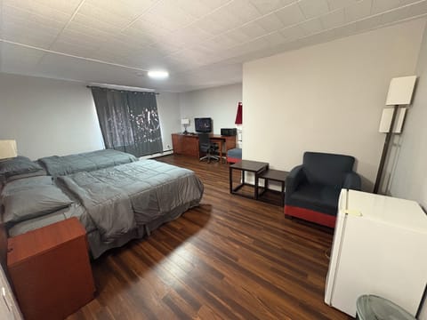 Standard Room, 2 Queen Beds | Individually decorated, individually furnished, desk, laptop workspace