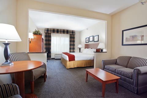 Suite, 1 King Bed | Pillowtop beds, in-room safe, desk, laptop workspace
