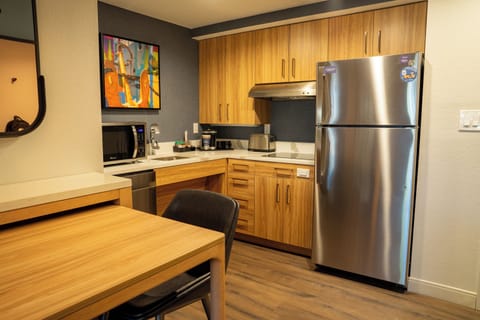 Suite, 1 Queen Bed, Accessible, Roll-in Shower | Private kitchen | Fridge, microwave, stovetop, dishwasher