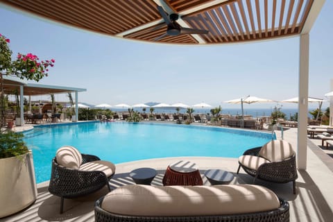 Indoor pool, seasonal outdoor pool, pool umbrellas, sun loungers