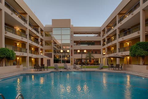 Outdoor pool, pool umbrellas, sun loungers