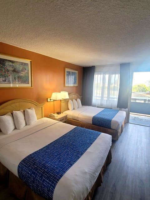 Superior Room, 2 Queen Beds | In-room safe, desk, iron/ironing board, free WiFi