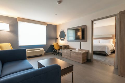 Suite, 1 King Bed with Sofa bed (Extra Living Area) | In-room safe, laptop workspace, soundproofing, iron/ironing board