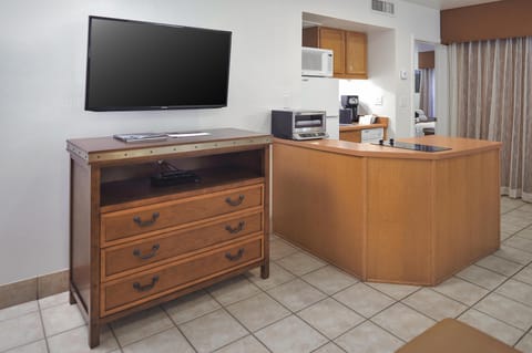 Fridge, microwave, coffee/tea maker, cookware/dishes/utensils