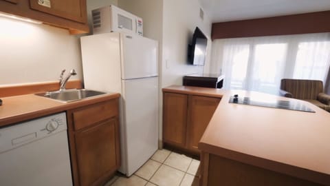 Standard Suite, 2 Bedrooms | Private kitchen | Fridge, microwave, coffee/tea maker, cookware/dishes/utensils