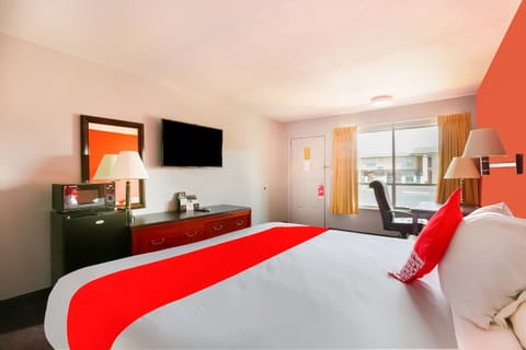 Premium Room, 1 King Bed | 1 bedroom, desk, iron/ironing board, free rollaway beds