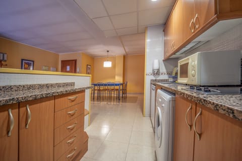 Family Apartment | Private kitchen | Full-size fridge, microwave, stovetop, coffee/tea maker