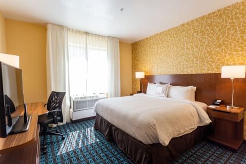 Room, 1 King Bed | Down comforters, in-room safe, desk, blackout drapes