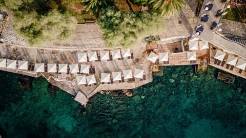 Beach nearby, white sand, sun loungers, beach umbrellas