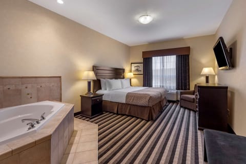 Suite, 1 King Bed, Jetted Tub | Premium bedding, pillowtop beds, desk, laptop workspace