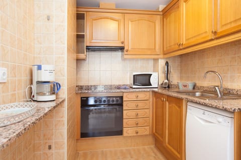 Apartment, 1 Bedroom, Balcony | Private kitchenette | Full-size fridge, microwave, oven, stovetop