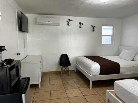 Standard Room, 2 Queen Beds, Non Smoking | Desk, laptop workspace, blackout drapes, free WiFi