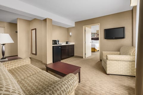 Suite, 1 King Bed (Additional Living Area) | In-room safe, desk, iron/ironing board, free cribs/infant beds