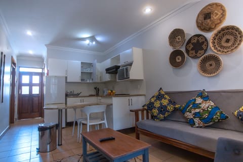 Signature Apartment | Private kitchen | Full-size fridge, microwave, oven, stovetop
