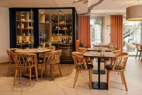 Breakfast, lunch, dinner served; local cuisine, pool views