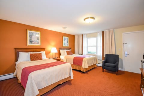 Deluxe Room, 2 Double Beds, Kitchen | Individually furnished, desk, laptop workspace, blackout drapes