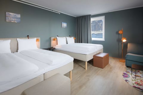 Family Room (Four) | Desk, blackout drapes, free internet, bed sheets