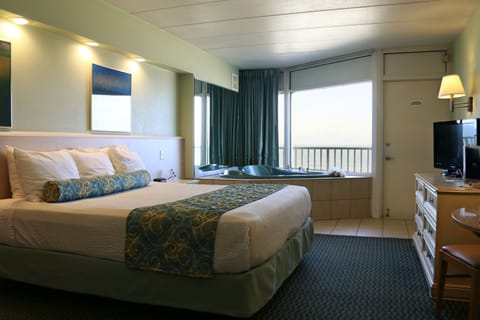 Superior Room, 1 King Bed, Ocean View, Oceanfront | Living area | TV