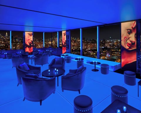 6 bars/lounges, rooftop bar, lobby lounge