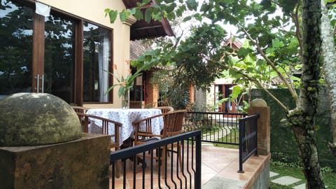 Family Suite, 2 Bedrooms, Refrigerator, Garden View | Terrace/patio