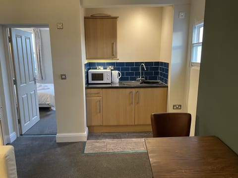 Apartment, 1 Bedroom | Private kitchen | Fridge, electric kettle