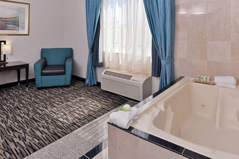 Suite, 1 Bedroom, Jetted Tub | Desk, laptop workspace, blackout drapes, iron/ironing board