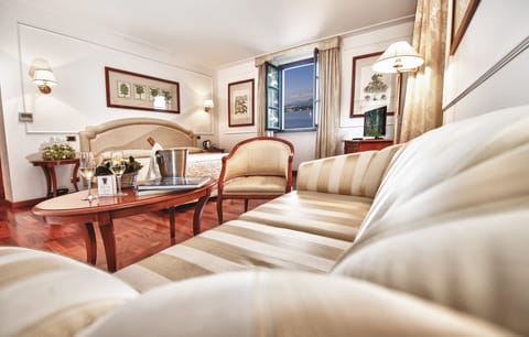 Junior Suite, 1 King Bed, Lake View | Living area | LED TV