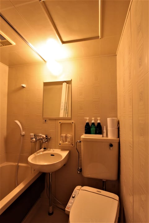 Twin Room with Private Bath Room (no Sofa Bed) | Bathroom | Separate tub and shower, free toiletries, slippers, electronic bidet