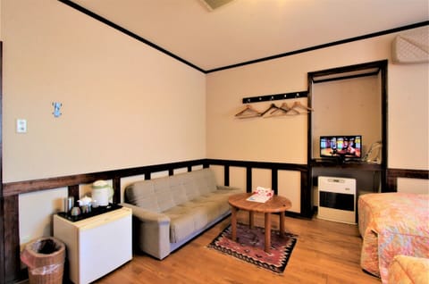 Twin Room with Sofabed, Private Bath Room | Individually decorated, individually furnished, blackout drapes