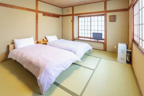 Japanese Style Room with Shared Bath Room | Individually decorated, individually furnished, blackout drapes