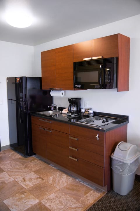 Fridge, microwave, stovetop, coffee/tea maker