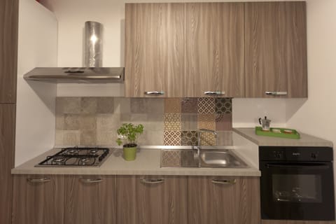 Design Apartment | Private kitchen | Mini-fridge, dishwasher, coffee/tea maker, electric kettle