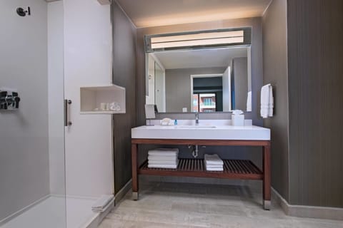 Suite, 1 King Bed with Sofa bed | Bathroom | Shower, free toiletries, hair dryer, towels