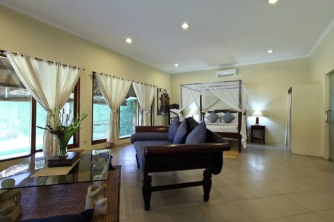 Villa, 1 Bedroom, Private Pool | Living area | 32-inch LCD TV with cable channels, TV, iPod dock