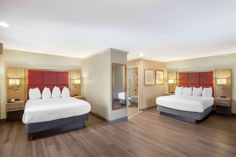 Standard Room, 2 Queen Beds, Non Smoking, Microwave (Oversized Room) | Desk, laptop workspace, blackout drapes, iron/ironing board