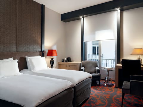 Courtyard room | Premium bedding, minibar, in-room safe, desk